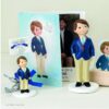 Figura de pastel para Comunión de niño con rosario y americana azul