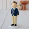 Figura de pastel para Comunión de niño con rosario y americana azul
